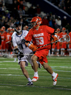 Luke Cometti looks to break free from Villanova midfielder Remington Pope.