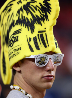 A fan of the Witchita State Shockers looks on prior to the game against the Louisville Cardinals.