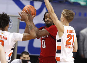 Buddy Boeheim, Joe Girard III and Marek Dolezaj combined to break open Syracuse's lead on a 14-3 run.