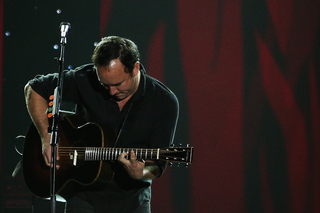 Dave Matthews performs on stage.