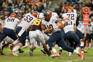 Terrel Hunt extends the play after a fake handoff.