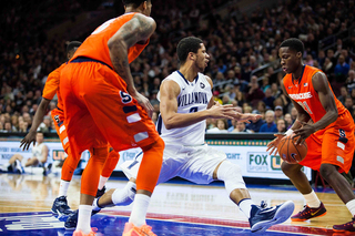 Tyler Roberson makes a defensive play to get back SU possession. 