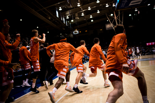 Syracuse rushes to center court to celebrate the overtime victory at No. 1 Duke — only the 10th home loss for the Blue Devils since 2000. 