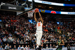 Battle slams the ball on a breakaway that enlivened the SU bench. The elation didn’t last long, though, as Baylor stormed back with a mini-run of its own. 
