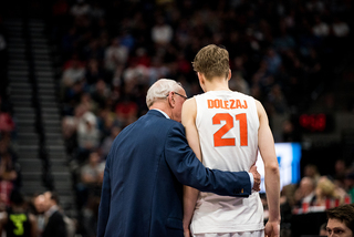 Boeheim chats with Dolezaj, who said after the game he wishes he were more assertive this season. 