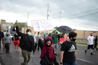 It rained several times during the protest, but that didn't deter more people from showing up.